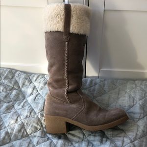 Naturalized knee high boots